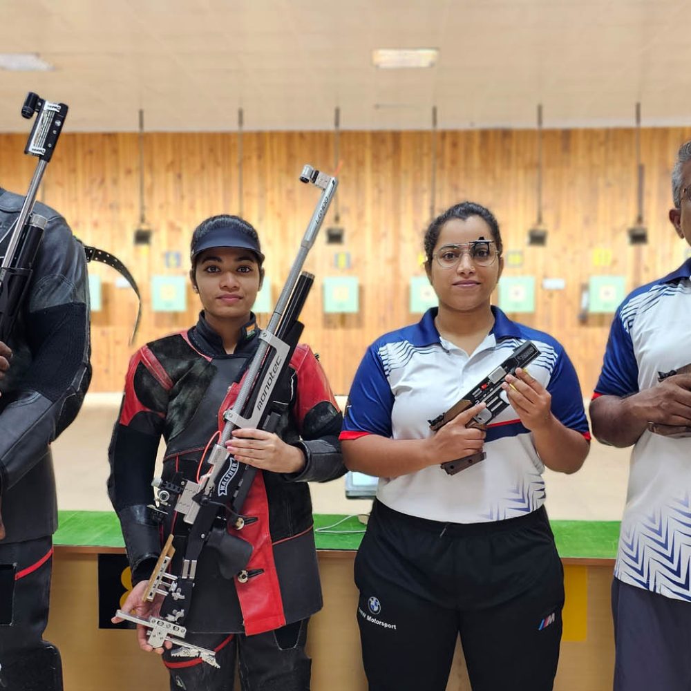 Coach Naveen P. R. instructing students during shooting practice